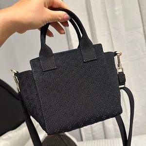 Rothy’s mini black handbag shine! Never used! NWOT